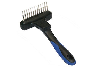 Twist &amp; Cling rolling detangling curry comb for dogs